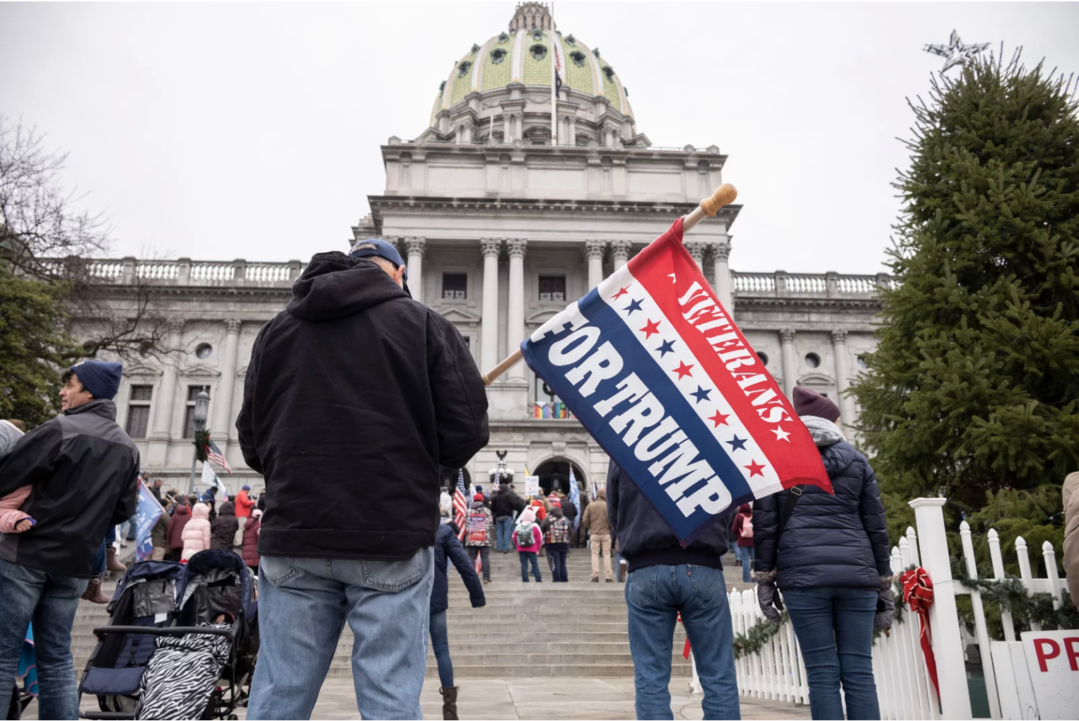 Supporters of then-President Donald Trump gather on the steps of the state Capitol on Jan. 5, 2021, in Harrisburg, Pa. Laurence Kesterson/AP